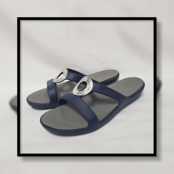 crocs with silver circle